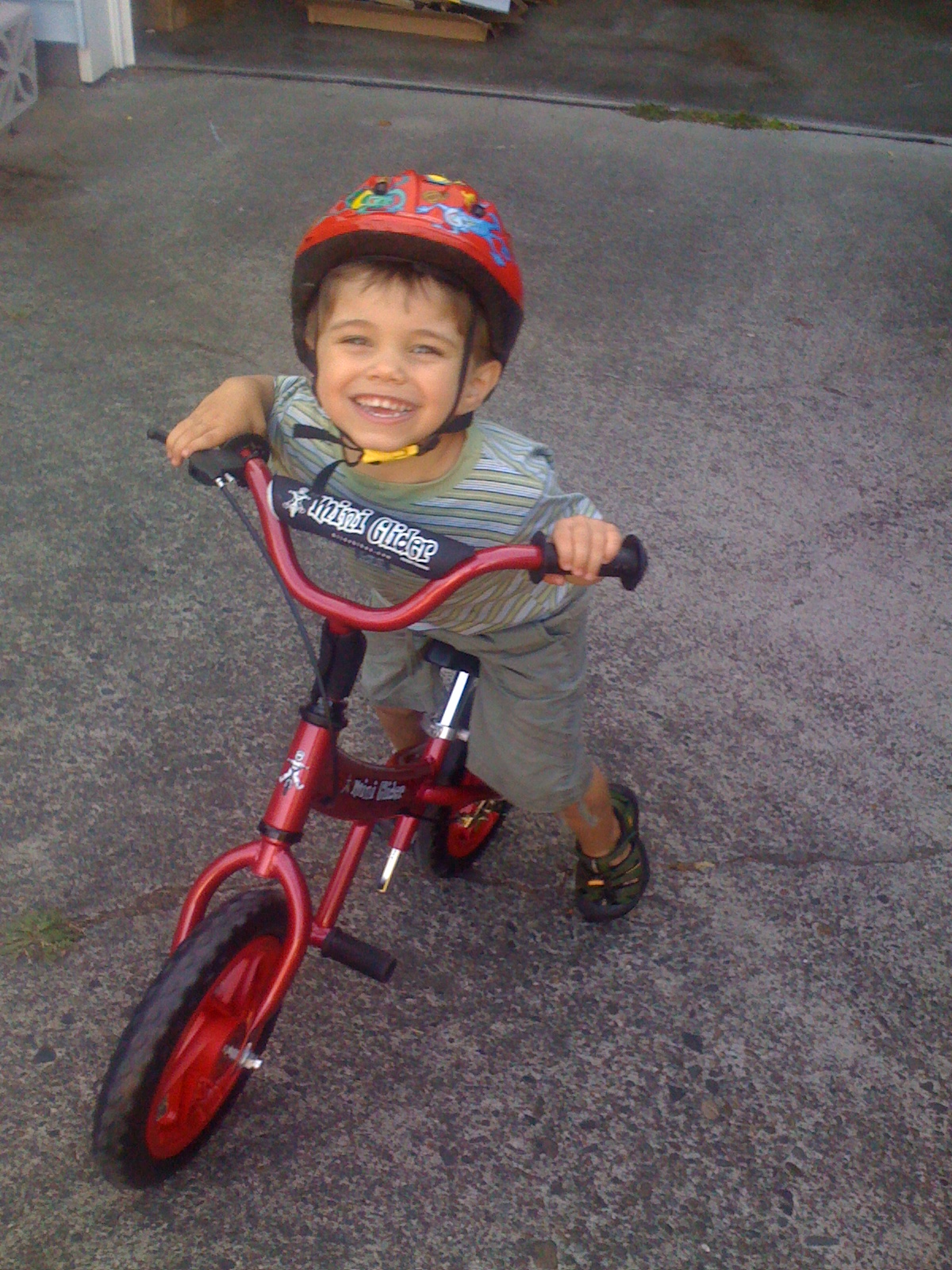 red mini glider balance bike