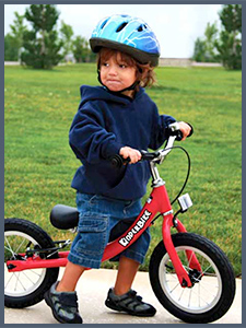 Young boy wearing a bike helmet